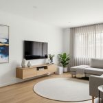 A bright, modern, and spacious living room after a professional home renovation.
